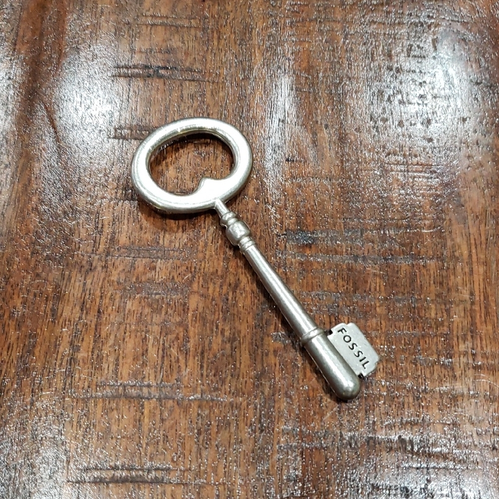 Fossil Silver Key Pendant